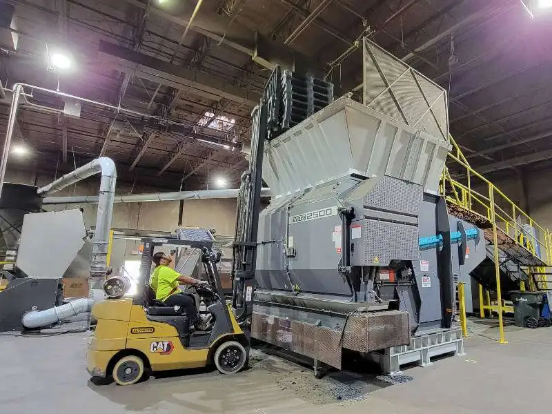 Fork lift moving pallets.